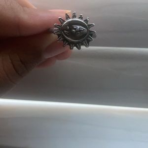 Faces in the sun ring